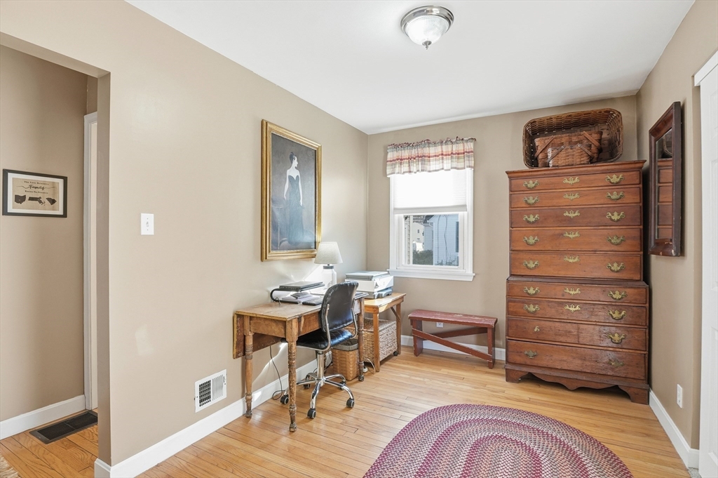 28 Sylvester Road Natick, MA 01760 - Photo 9 of 30 a view of a livingroom with furniture and windows