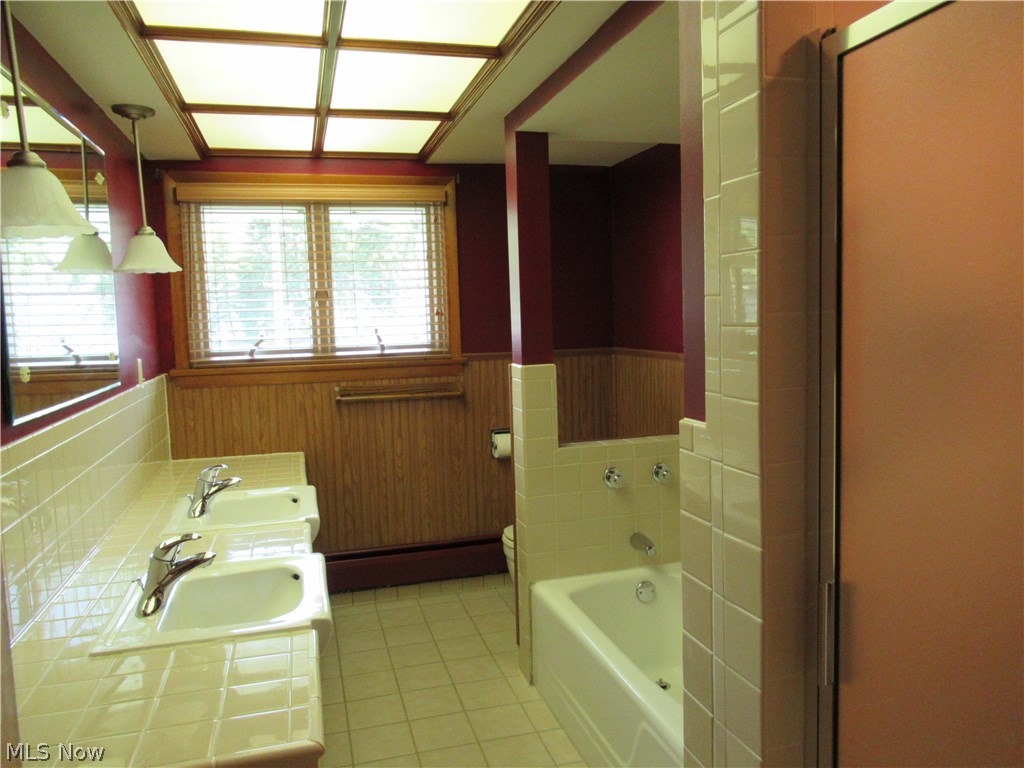 17492 Shurmer Road Strongsville, OH 44136 - Photo 11 of 17 Main Bath w/twin sinks, walk-in shower plus tub.
