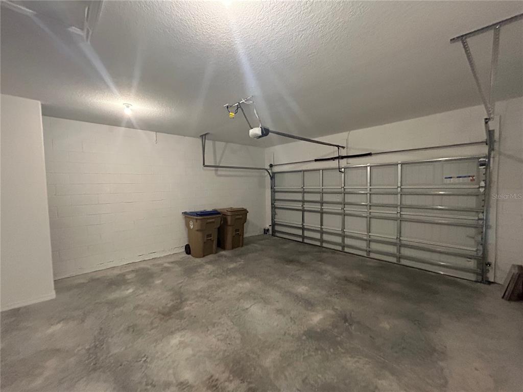 5873 Beefmaster Road St. Cloud, FL 34771 - Photo 12 of 16 a view of a garage