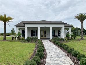 5873 Beefmaster Road St. Cloud, FL 34771 - Photo 14 of 16 front view of a house with a yard