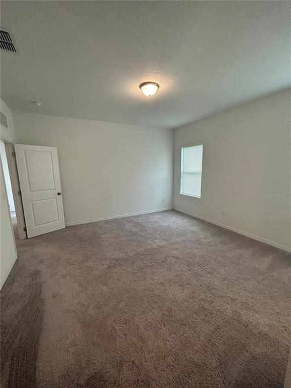 5873 Beefmaster Road St. Cloud, FL 34771 - Photo 7 of 16 a view of empty room