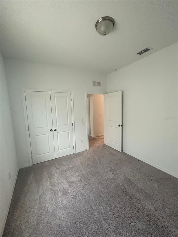 5873 Beefmaster Road St. Cloud, FL 34771 - Photo 9 of 16 a view of an empty room and entryway