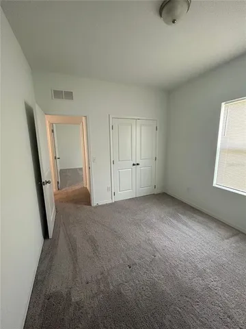 an empty room with white walls and white walls