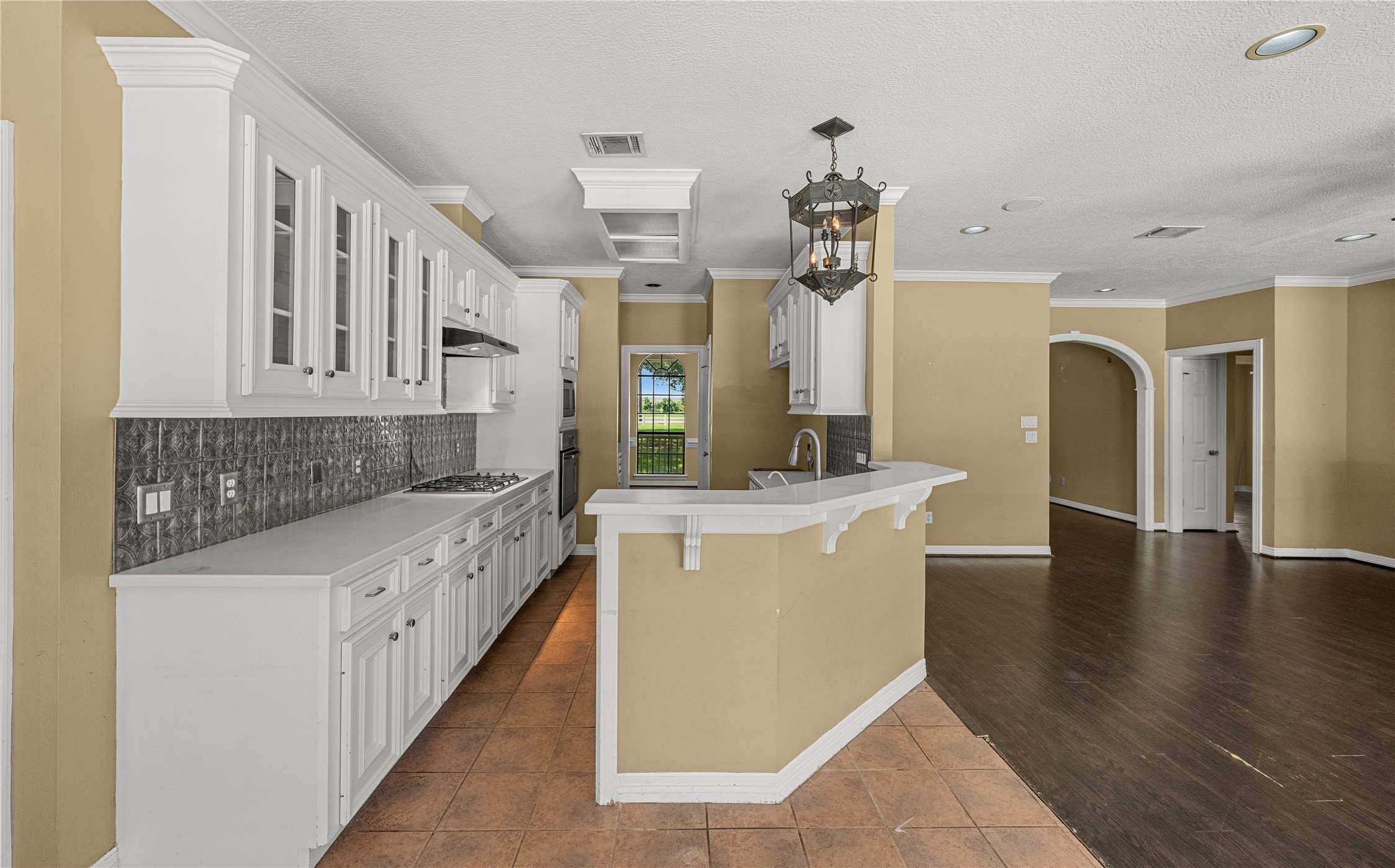 20240 Cypress Rosehill Road Tomball, TX 77377 - Photo 13 of 26 a kitchen with stainless steel appliances granite countertop a white stove top oven and a refrigerator