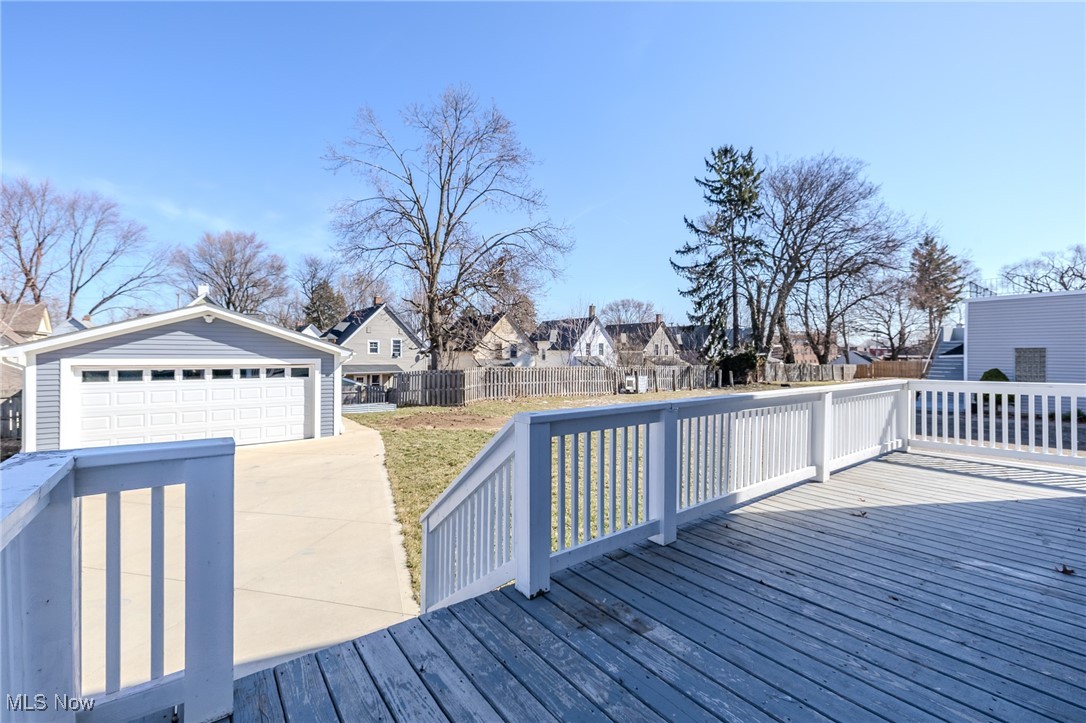 3516 Broadview Road Cleveland, OH 44109 - Photo 40 of 42 Wooden deck with a residential view, an outbuilding, a detached garage, and fence