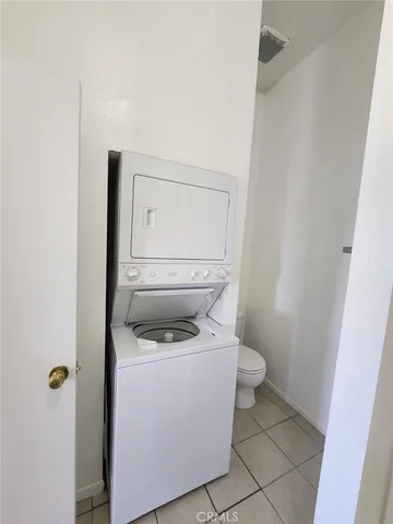 a bathroom with a toilet and a sink