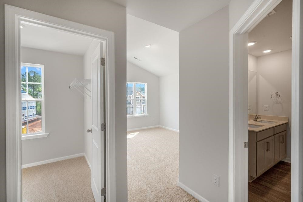 115 Starlight Street Sanford, NC 27330 - Photo 15 of 37 a view of hallway with washer and dryer