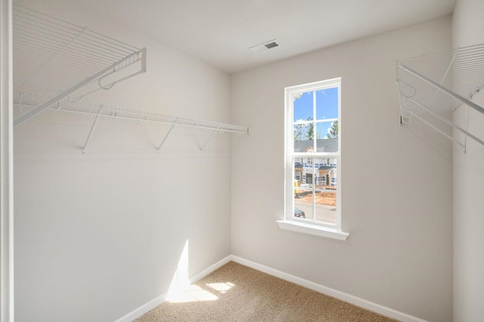 115 Starlight Street Sanford, NC 27330 - Photo 16 of 37 a view of an empty room with a window