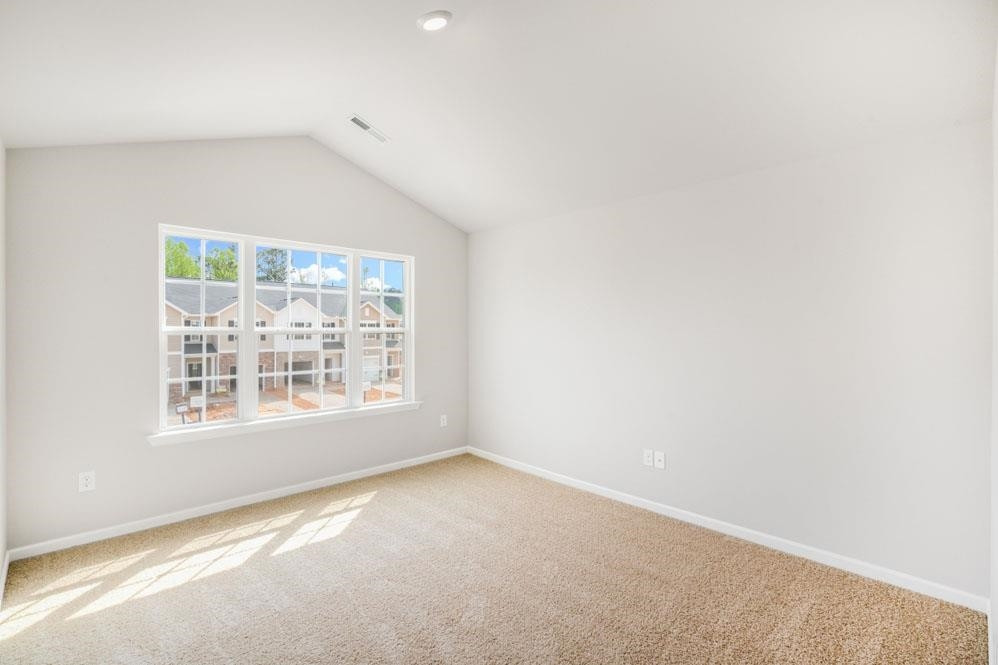 115 Starlight Street Sanford, NC 27330 - Photo 17 of 37 an empty room with a window