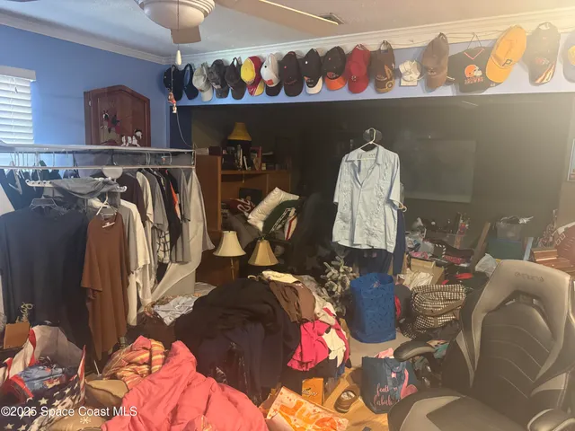 a room with lots of different colored cloths