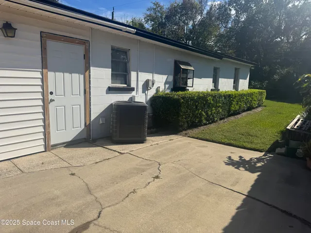a front view of a house with garage