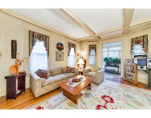 18 Washington Road Springfield, MA 01108 - Photo 4 of 22 a living room with furniture a rug and a lamp