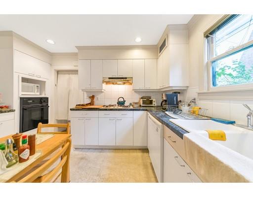 18 Washington Road Springfield, MA 01108 - Photo 8 of 22 a kitchen with stainless steel appliances granite countertop a sink and a stove