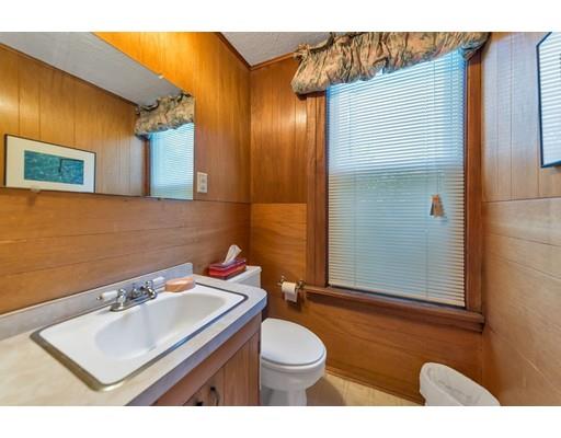 18 Washington Road Springfield, MA 01108 - Photo 10 of 22 a bathroom with a sink toilet and shower
