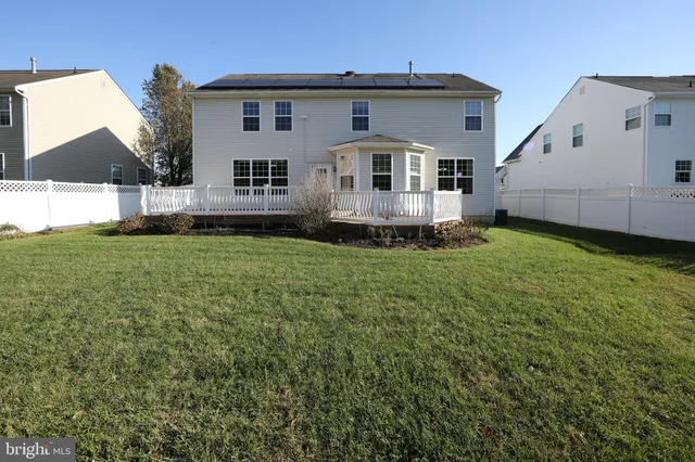 a view of a back yard of the house