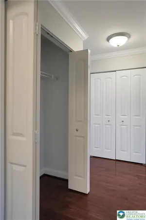 a kitchen with stainless steel appliances granite countertop wooden cabinets a stove top oven a sink and dishwasher