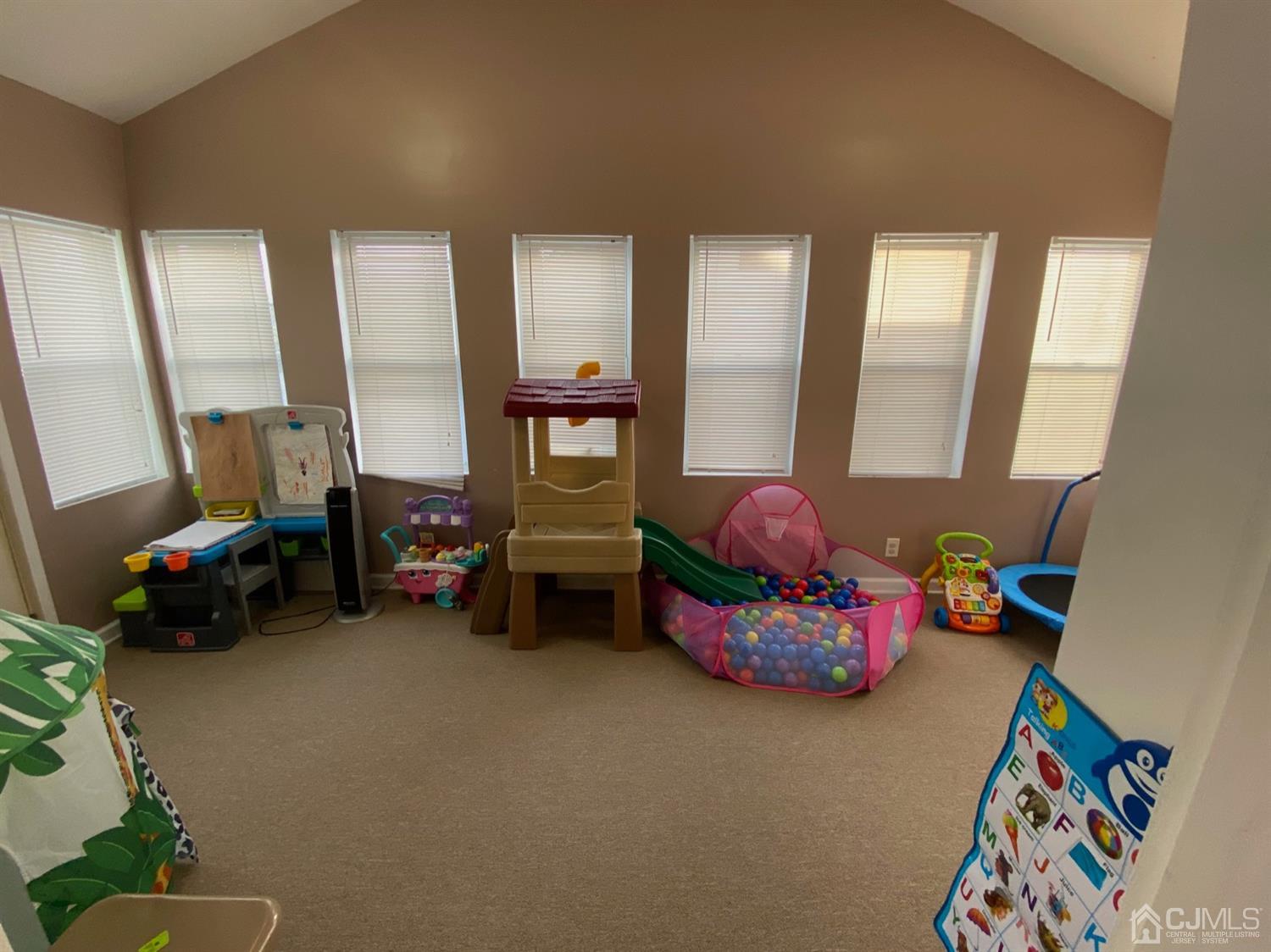 29 Longfield Road New Brunswick, NJ 08901 - Photo 13 of 25 a living room with furniture and a toys