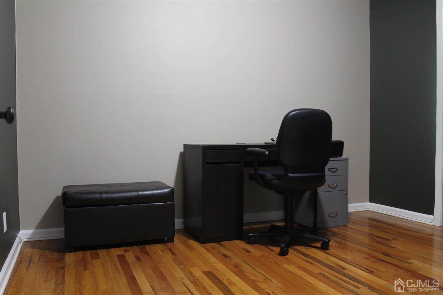 29 Longfield Road New Brunswick, NJ 08901 - Photo 18 of 25 a view of workspace with wooden floor