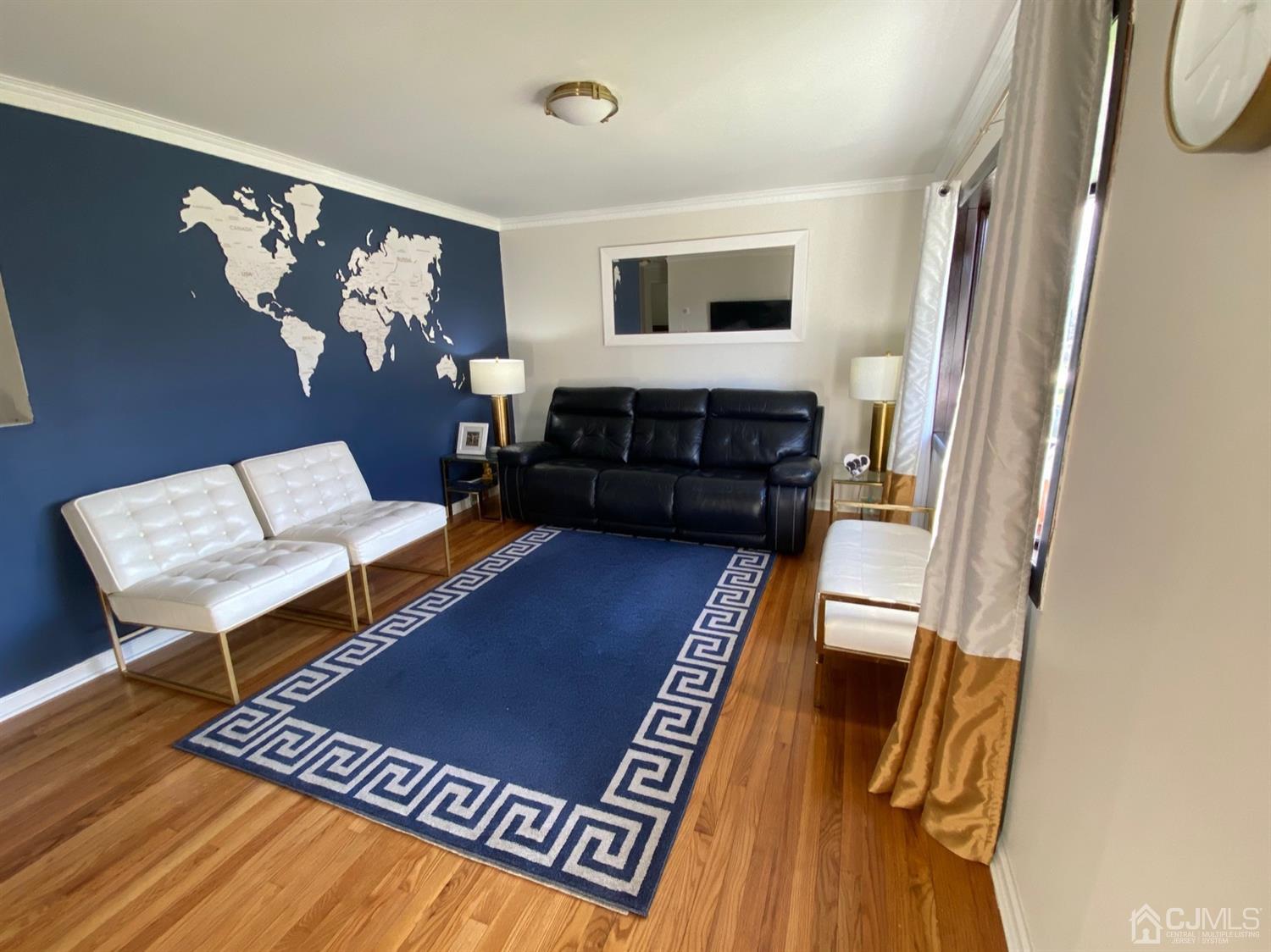 29 Longfield Road New Brunswick, NJ 08901 - Photo 6 of 25 a living room with furniture and a rug