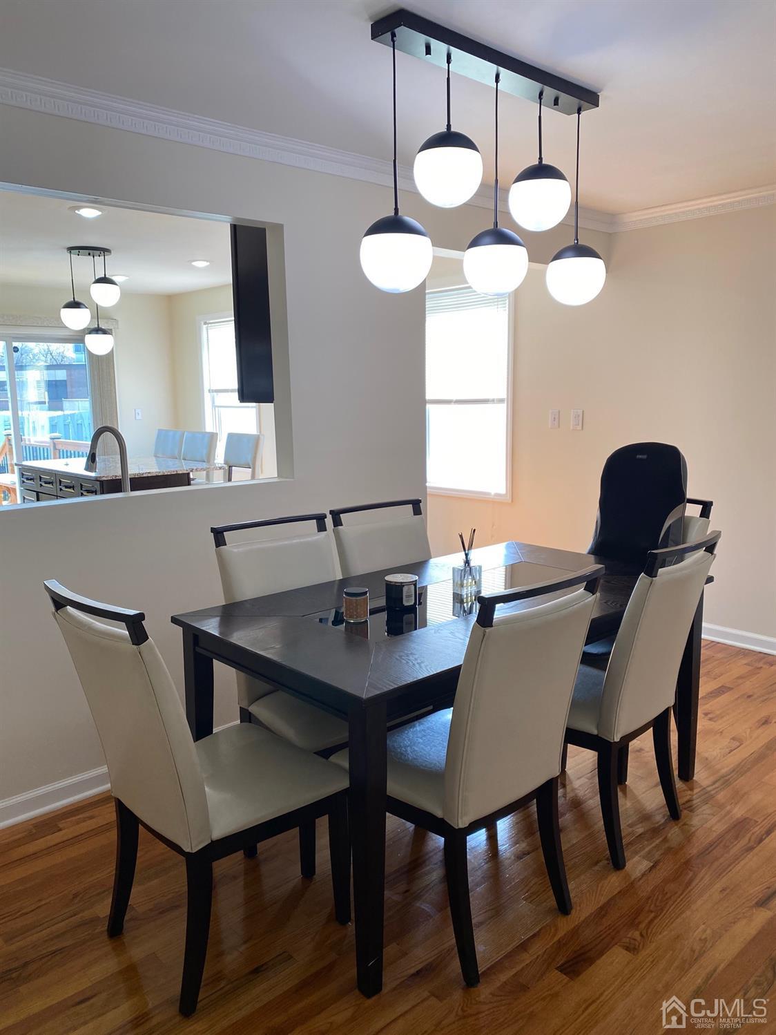29 Longfield Road New Brunswick, NJ 08901 - Photo 8 of 25 a view of a dining room and chairs