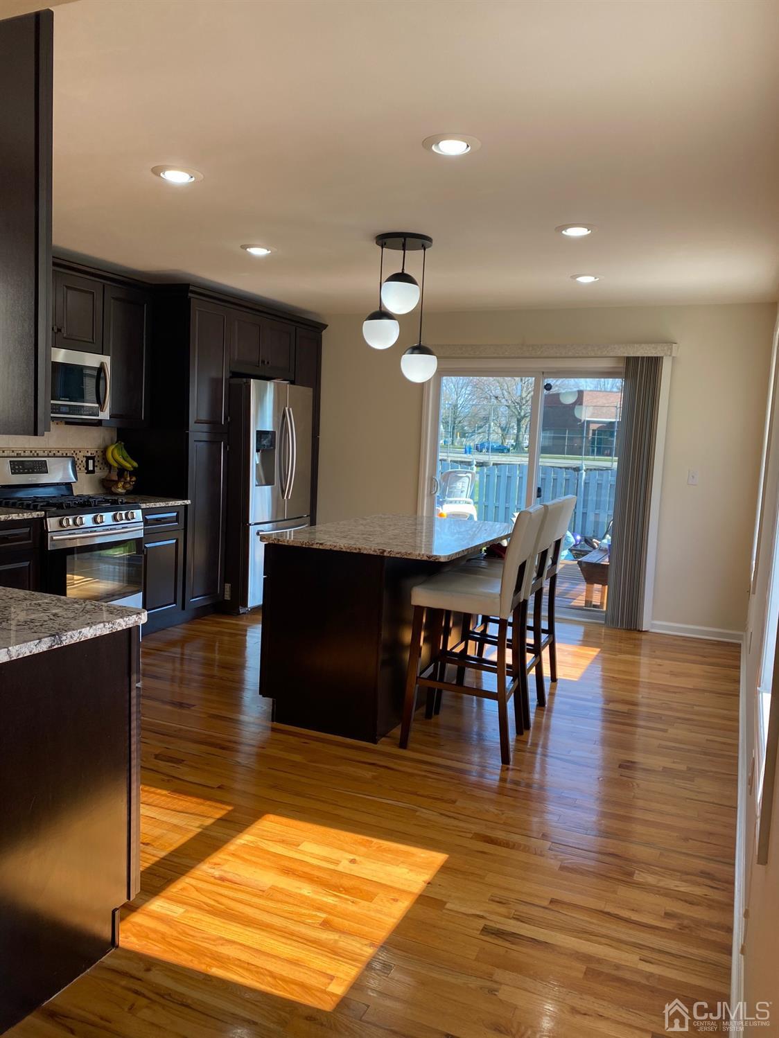 29 Longfield Road New Brunswick, NJ 08901 - Photo 9 of 25 a view of a dining room with furniture