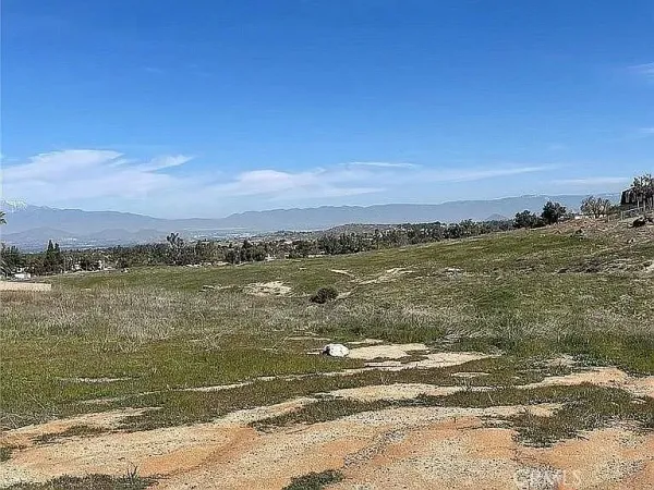 a view of an ocean and sunset