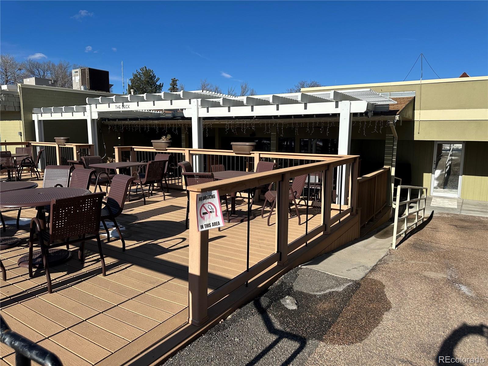615 South Clinton Street, Unit 9B Denver, CO 80247 - Photo 23 of 24 a view of a balcony with chairs