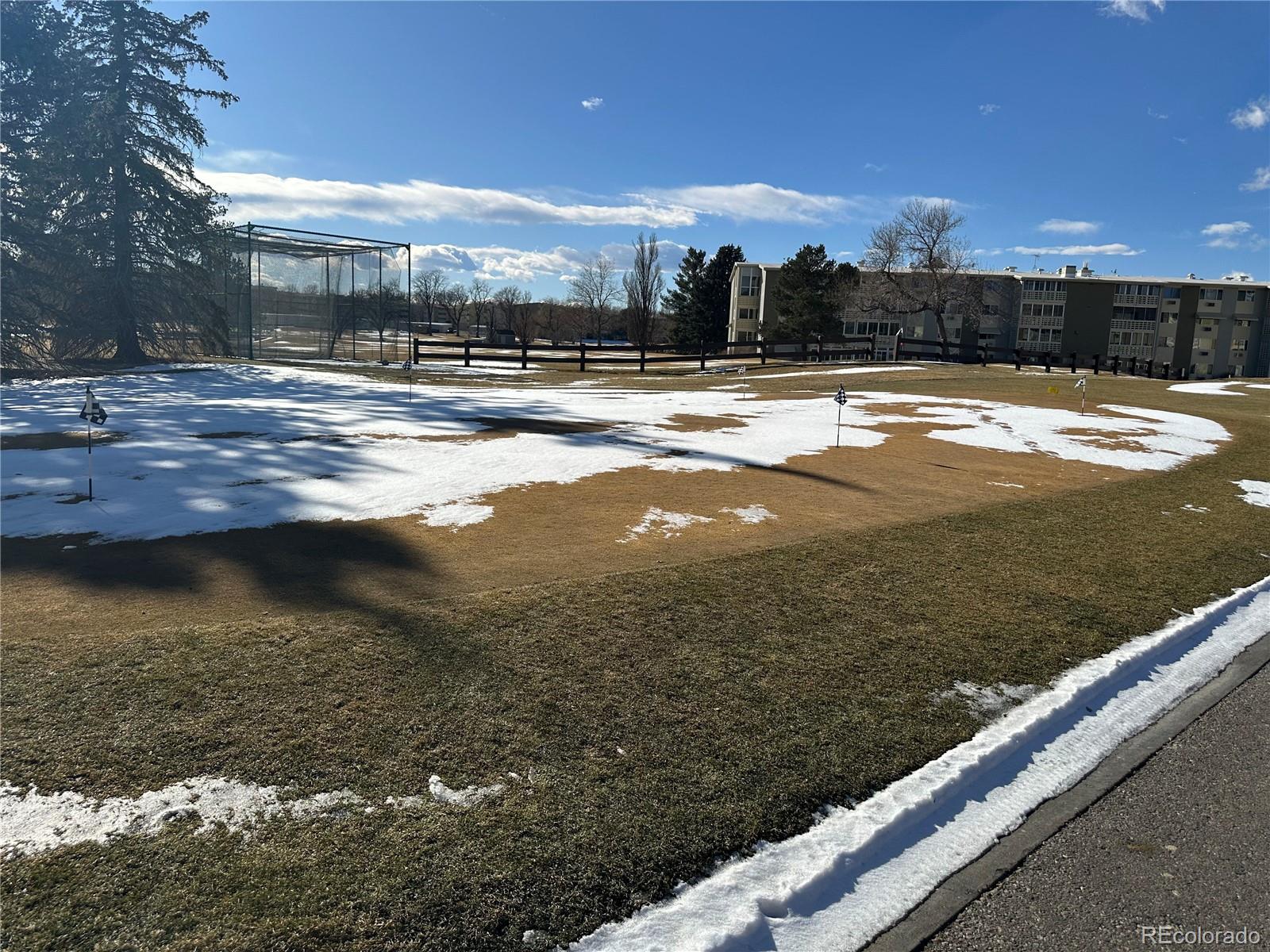 615 South Clinton Street, Unit 9B Denver, CO 80247 - Photo 24 of 24 a view of swimming pool with outdoor seating and yard in back
