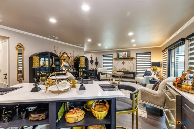 a view of a house with a wooden fence