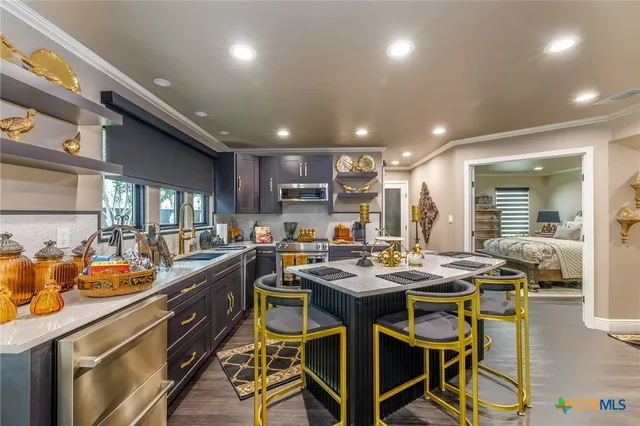 an aerial view of a house with a ocean view