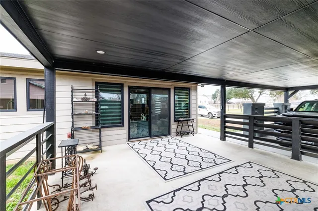 a view of a bedroom from a hallway
