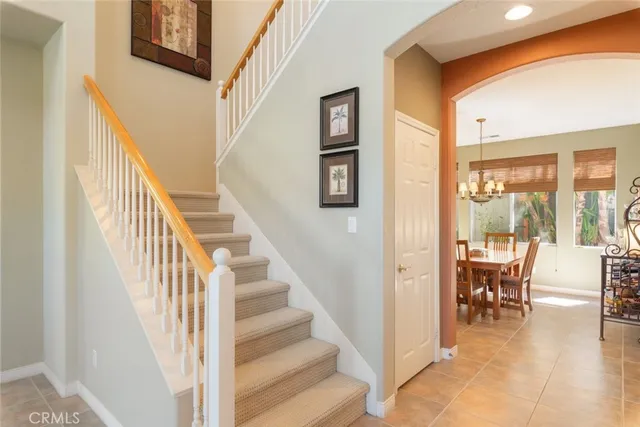 a view of a livingroom with furniture and entryway