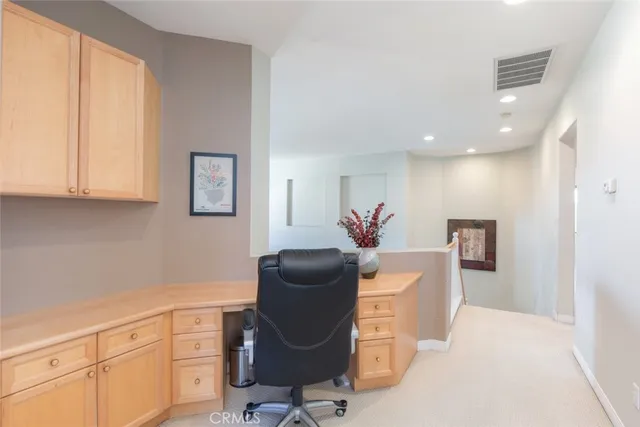 a bedroom with bed and a window