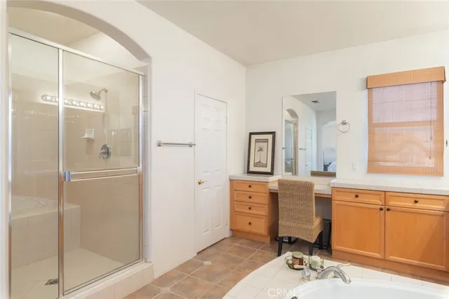 a backyard of a house with yard barbeque oven and outdoor seating