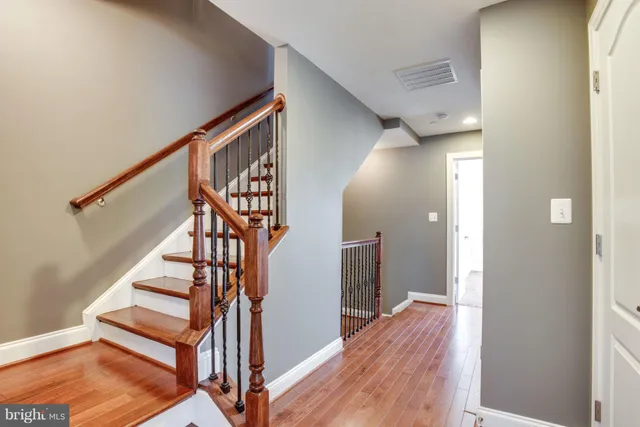 a view of entryway with wooden floor