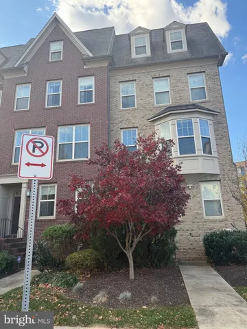 a front view of a multi story residential apartment building