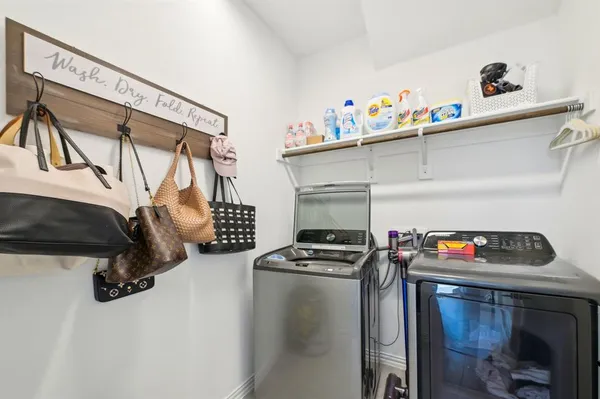 a utility room with dryer and washer