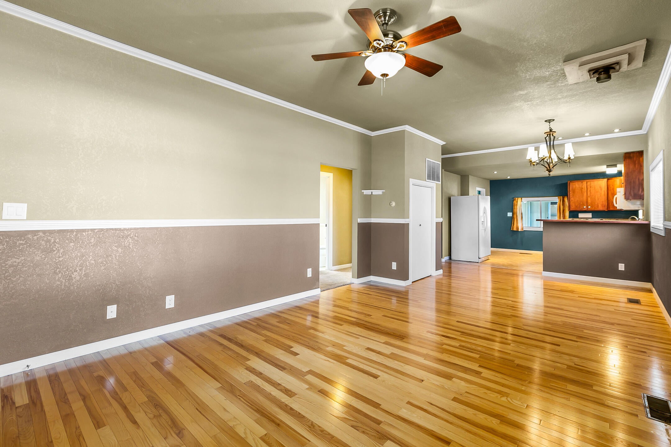 205 Southwest 9th Street Redmond, OR 97756 - Photo 10 of 24 Open to the kitchen with hardwood flooring