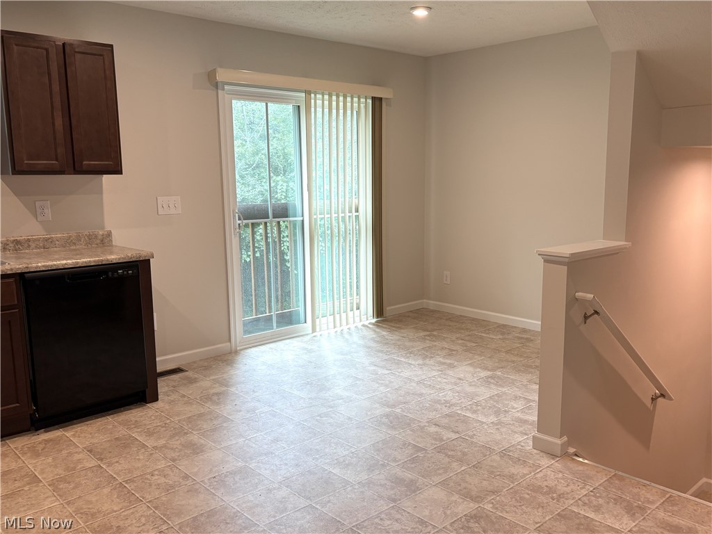 210 Raintree Lane Painesville, OH 44077 - Photo 3 of 20 Spacious dinette with view of the woods