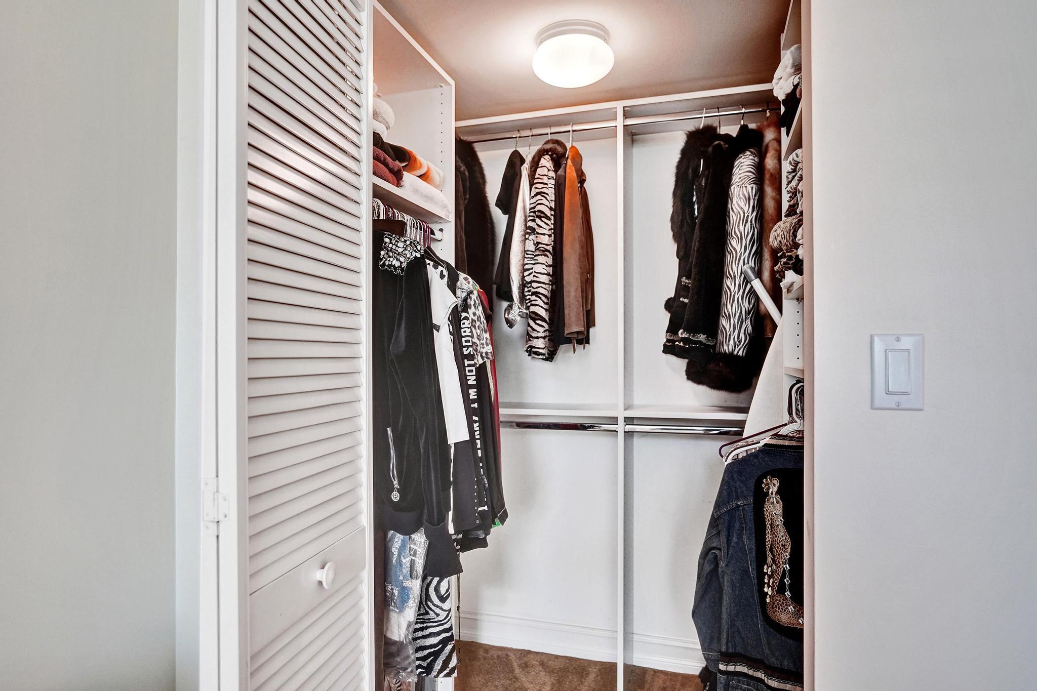 99 Southeast Mizner Boulevard, Unit 802 Boca Raton, FL 33432 - Photo 36 of 54 Genrous walk-in closets