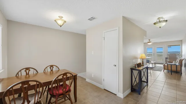 a bedroom with a bed and a mirror