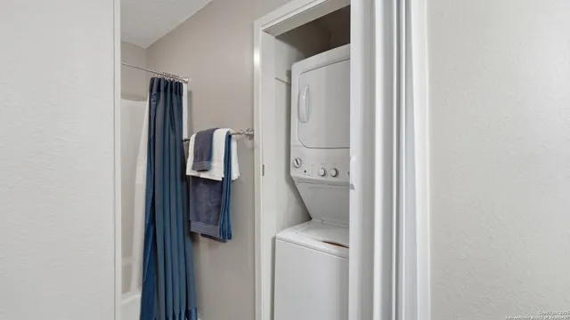 a view of a balcony with wooden floor