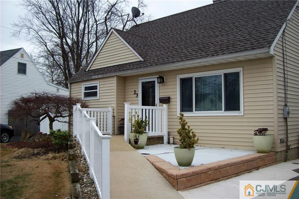23 Rodney Road East Brunswick, NJ 08816 - Photo 2 of 25 a front view of a house with garden