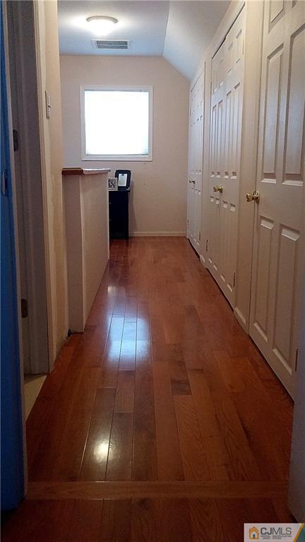 23 Rodney Road East Brunswick, NJ 08816 - Photo 15 of 25 a view of empty room with wooden floor