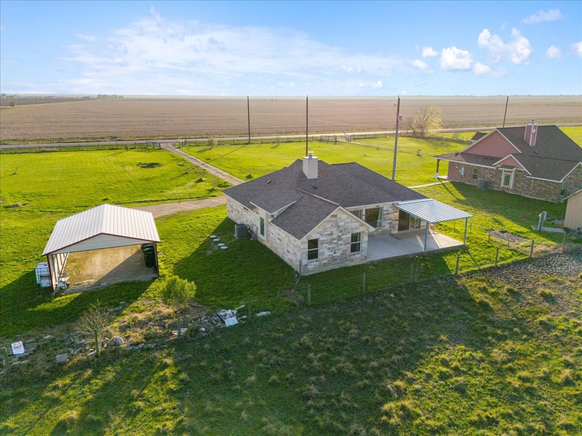 2407 Thuesen Road Beasley, TX 77417 - Photo 28 of 34 a view of a house with a backyard