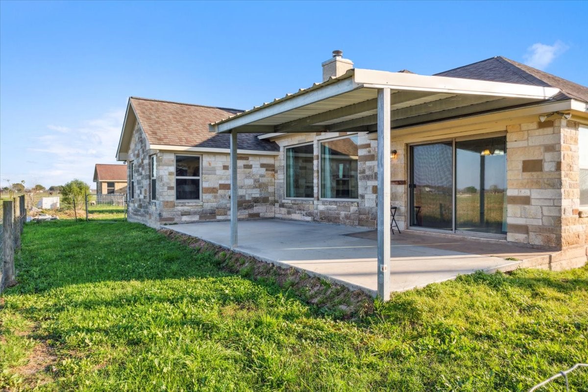2407 Thuesen Road Beasley, TX 77417 - Photo 30 of 34 a view of a house with a patio