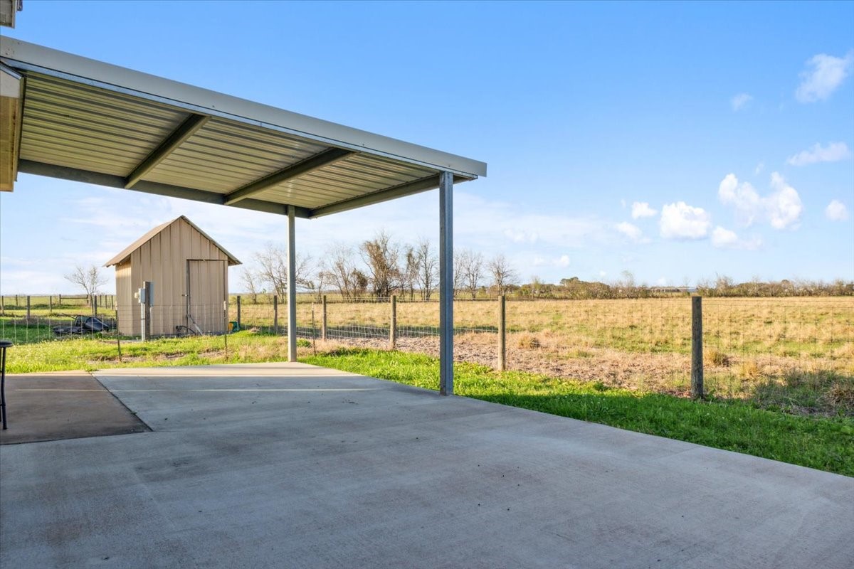 2407 Thuesen Road Beasley, TX 77417 - Photo 31 of 34 a view of a swimming pool with a yard