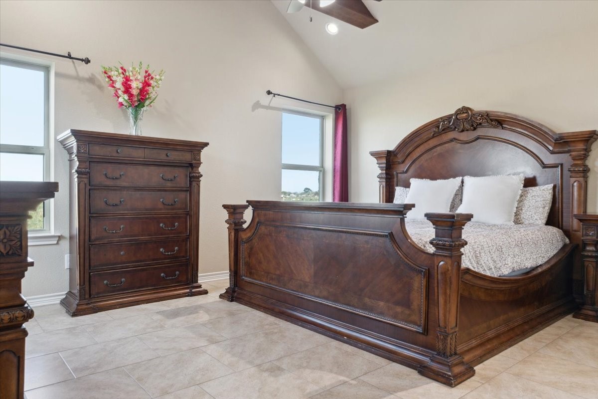 2407 Thuesen Road Beasley, TX 77417 - Photo 5 of 34 a bedroom with a bed and a dresser