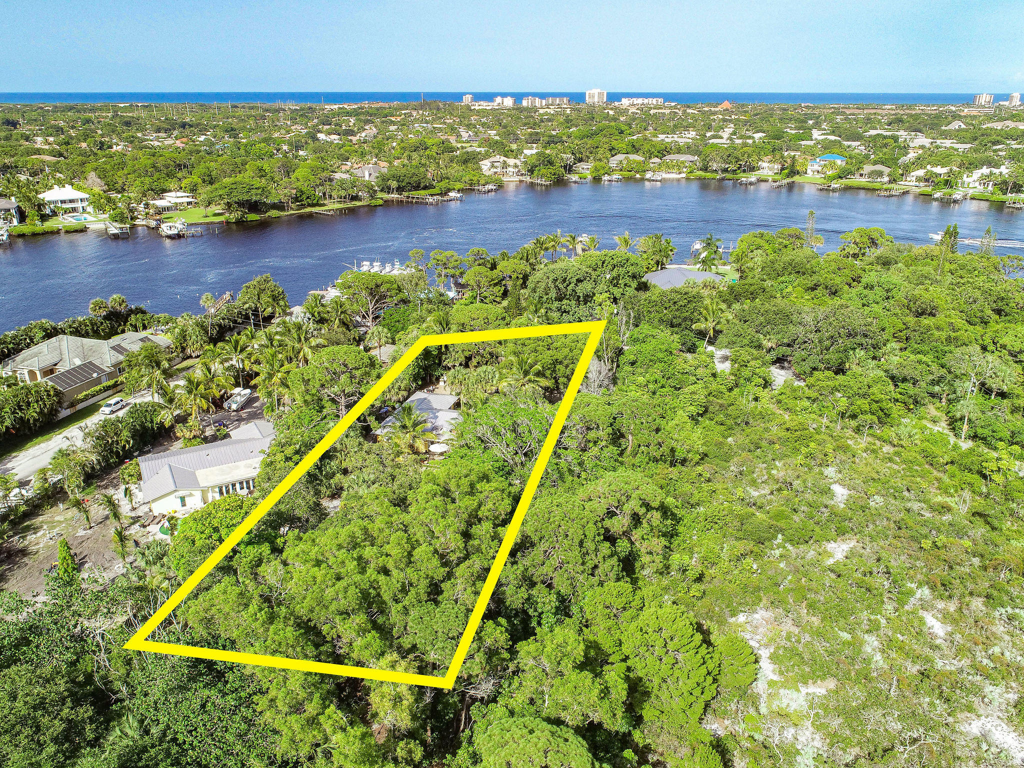 19943 Pinetree Drive Jupiter, FL 33469 - Photo 35 of 42 a view of swimming pool from a lake