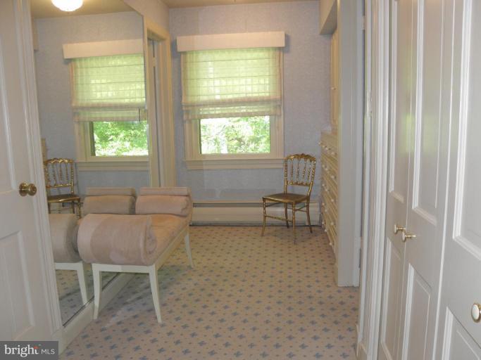 7004 Nevis Road Bethesda, MD 20817 - Photo 14 of 24 a living room with furniture and a window